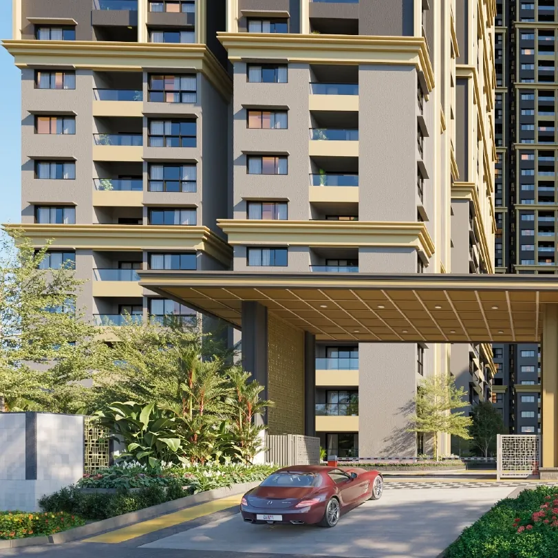 The tower of Godrej Epoque beside its art deco clubhouse and gardens
